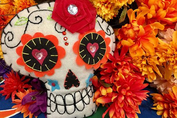 Skull and flowers on Day of the Dead Altar